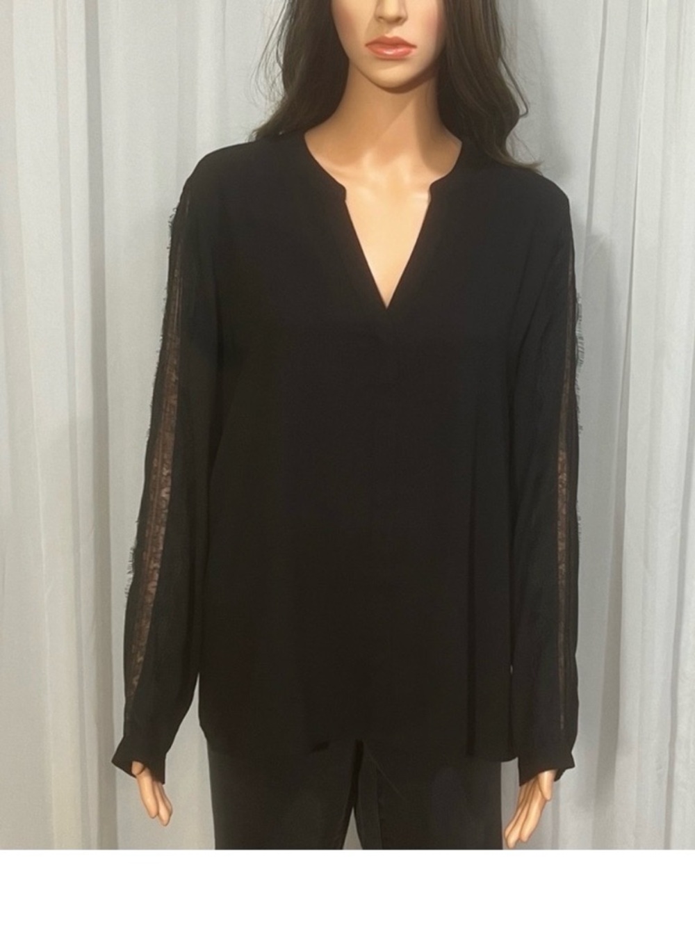 Jennifer Lopez Elegant Black Blouse with Lace Sleeves